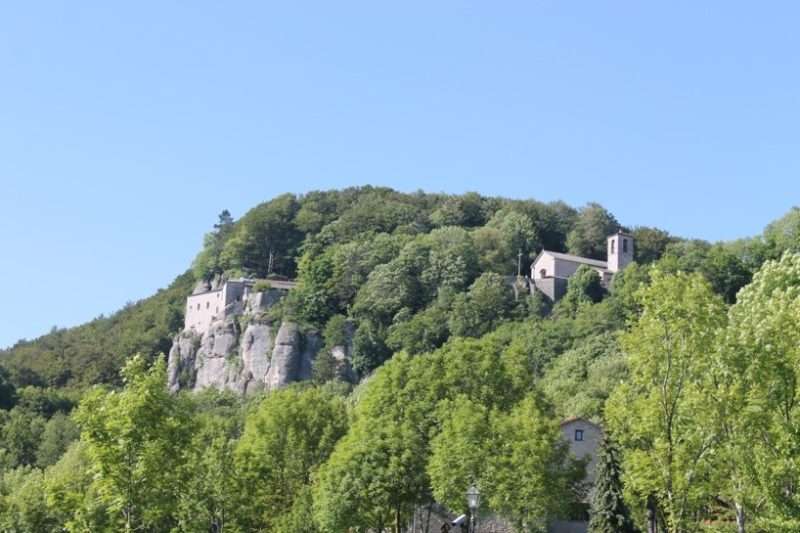Mountains and historical buildings.